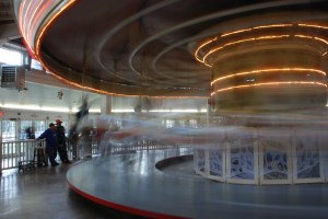 Carousel at Crossroads Village and spectators.  Photo by Grace Grogan