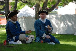 Soldiers take a break during the Feast of the St. Clair in Port Huron.  Photo by Grace Grogan