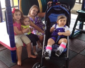 While we were not invited to sibling visits, the biological mother's family was allowed to attend. This photograph is a niece of the biological mother, in yellow is Kae-Lee Grogan, lost to adoption, Katlyn Hosang, half-sister to Kiley and Kae-Lee and who is being adopted by her step-grandfather, and in the stroller is Kiley Grogan, who we are trying to adopt.