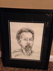 A sketch done of Ron, the artist was Europeon and didn't want his glasses on because she wanted to see his eyes.  Not my favorite, but he likes it.