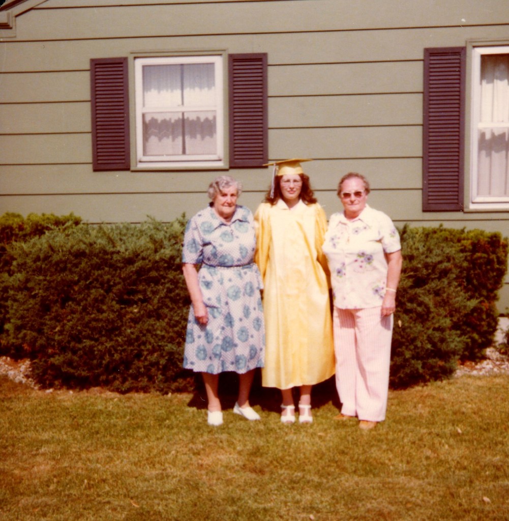My high school graduation in 1978 with my two grandmothers